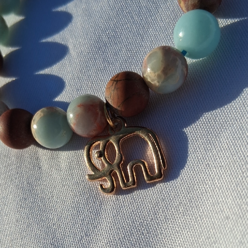 Elegant Beaded Bracelet with Elephant Charm